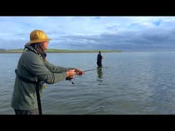 Standing in the Water Catching Fish for Dinner