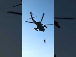 Follow soldiers as a Black Hawk hoists them into the sky during medevac training