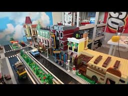 LEGO City Figsdale Update 75 - Minifigs all around doing crazy stuff and building placements.