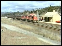 Australian diesel locomotives 48119 & 48107 - Charbon tour - June 1995.