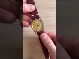 Gold bezel and champagne dial