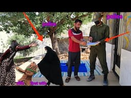 police arrive to help Hojat with his divorce case from his first wife and bring a summons.