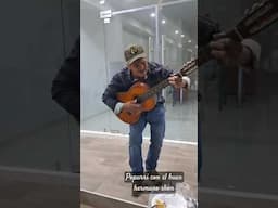 nuestro hermano asencion con la guitarra