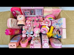 Box full of pink stationery - unicorn pencil case, piggybank, doraemon sharpner, 3d eraser, crayons
