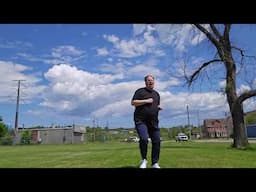 The Guy Doing a Tornado Siren and Spinning Around Again