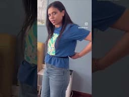 Use a belt to turn your top into a crop top.