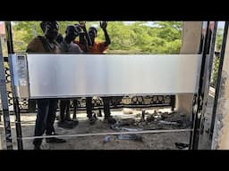Building in 🇬🇭 Ghana; Pivot Door functionality test by installer, Kingsley +233244806707