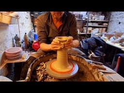 How to make pottery cylinder vases on the wheel.