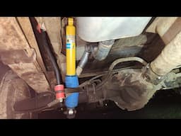 Replacing rear shocks and sway bar links on a Ford Truck.
