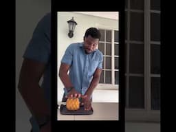 Opening a pineapple without no knife 🤔