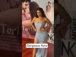 #NyraBanerjee stuns in a shimmering thigh-high slit gown with sheer corset and sequin detailing