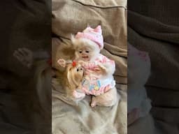 Baby yeti has a tiny puppy