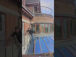 Trying to find an open window on this abandoned mansion.Climbing across rooftops