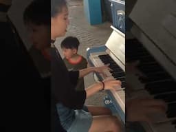 Playing stride piano in random street