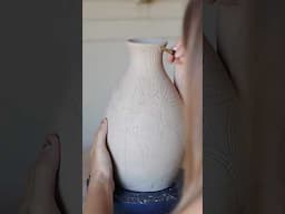 Carving a red panda vase