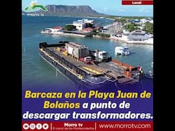 Barcaza en la Playa Juan de Bolaños a punto de descargar transformadores.