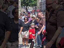 Handsome kid dressed like a King's Guard