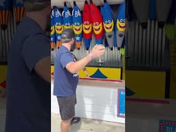 The pain behind the smile 😅 #carnivalgames #blockbuster #fail
