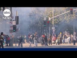Crowds in downtown Los Angeles start getting dispersed by police