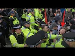 Woman hit in the face by police officer as counterprotesters scuffle during UKIP rally in Manchester