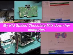 kid spilled chocolate milk down her computer