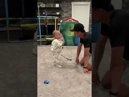 Day 1: Can an 18-Month-Old Hit a Hole in One?