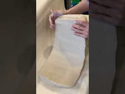 Smacking clay to prep for rolling slabs and to destress! #madewithclayshare #pottery