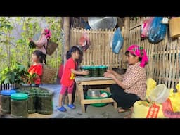 Mother and daughter go together to pick cassava leaves, bring them home to ferment to eat and sell.