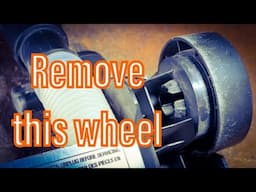Remove a Rear Plastic Vacuum Wheel (Dirt Devil / Bissell)