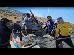 Nomadic men building the Fariba's new house