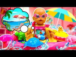 Baby Annabell doll wants to play with summer toys at the beach! Summer games at home.