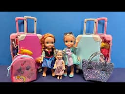 Packing the bags ! Elsa & Anna toddlers - getting ready for a trip - baggage - Barbie dolls