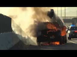 CAUGHT ON VIDEO: Firefighters battle vehicle fire on Las Vegas freeway