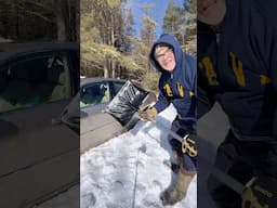 This car is buried in ice. Can I use a regular snow shovel to dig it out? I think not.