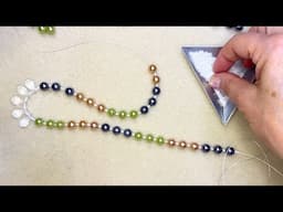 How to Make a Color Blocked Pearl and Crystal Necklace by Deb Floros.