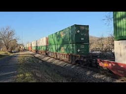 Huge Intermodal,  Railray shadow wave, Empty trash containers headed back to New York