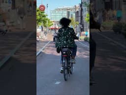 People cycling past in Amsterdam