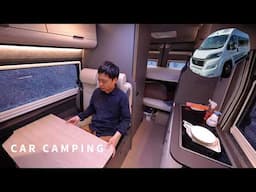 A deserted forest, drawn into the darkness. Car camping in a top-quality camper
