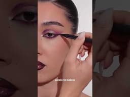 A dreamy purple shimmer eye look that catches the light with every blink! Credits: @amiliabernini