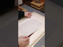 Turning my last video's print into book cloth. #bookbinding #bookcloth