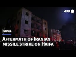 Aftermath of Iranian missile strike in northern Israeli city of Haifa | AFP