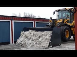 Volvo L60H with (YPV isrivarskopa) ice scraper bucket in snow removal