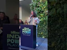 Russ accepts the 2025 Billboard Indie Trailblazer Award