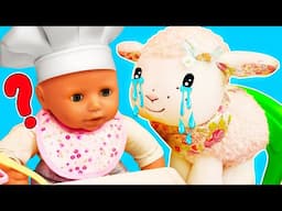 Baby Annabell doll wants to play outdoors and feed a toy baby sheep.