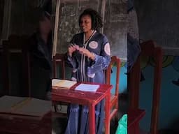 The director, mother of nine children and 250 pupils.