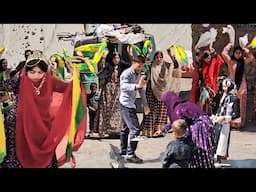 Village Wedding, Family Moments, and a Wandering Vendor"