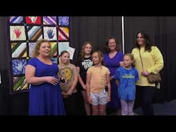Girl Scout Troop Displays Quilt at AQS QuiltWeek - Paducah 2025