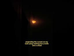 Projecting the sunset on my wall using a knife and a sheet #astronomy
