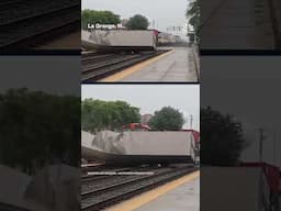 Freight train and semitruck collide at suburban rail crossing
