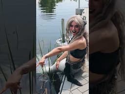This mermaid doesn't want to get into the gross water...